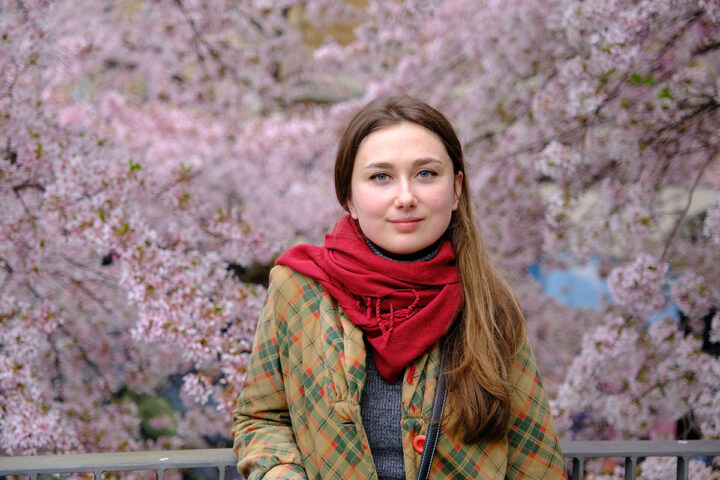Nadia in front of cherry blossom