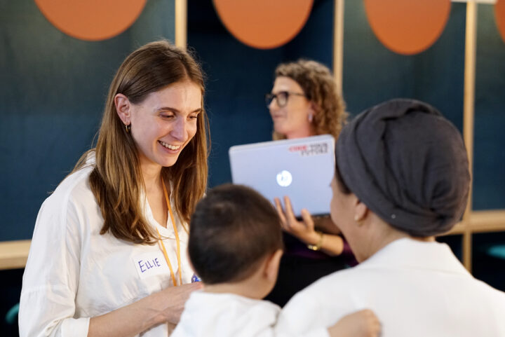 Ellie with Trainees at an event