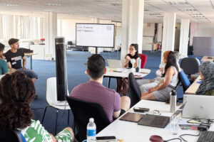 Trainees watching a talk on user control and freedom