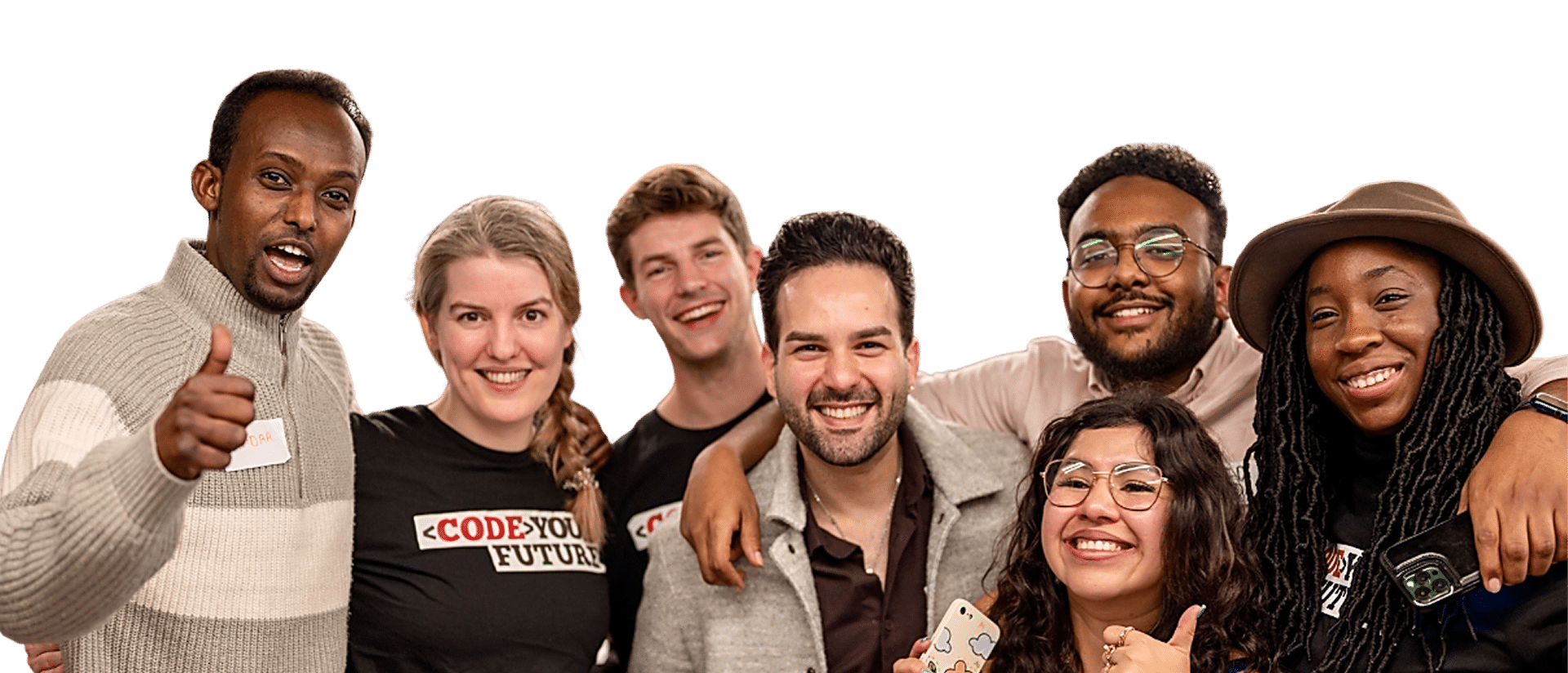 CodeYourFuture developers smiling together